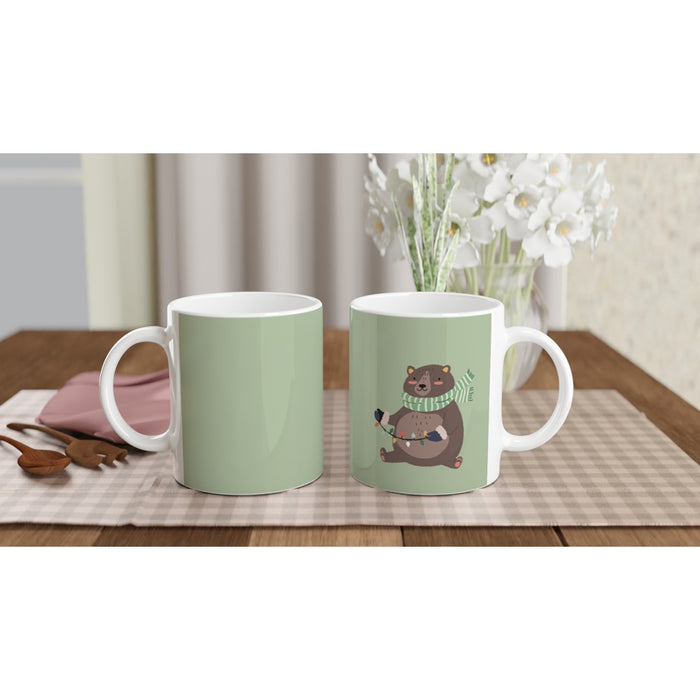 Tasse Winterbär - süßer Bär mit Schal und Lichterkette, grün