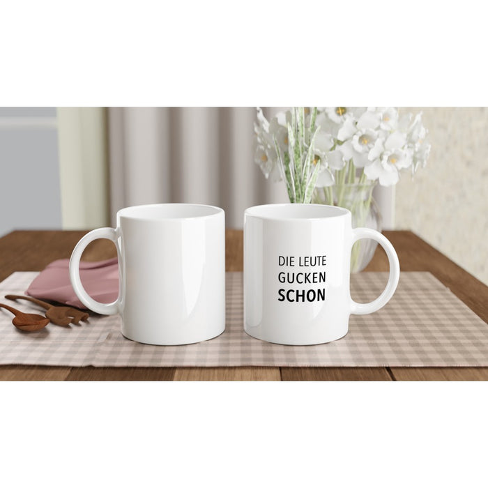 Tasse DIE LEUTE GUCKEN SCHON - schwarz