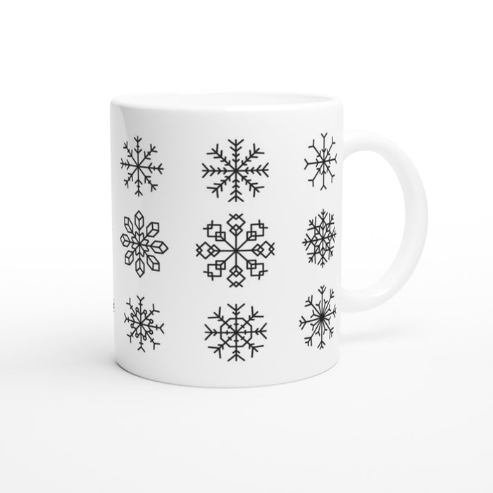 Tasse mit verschiedenen Schneeflocken - schwarz