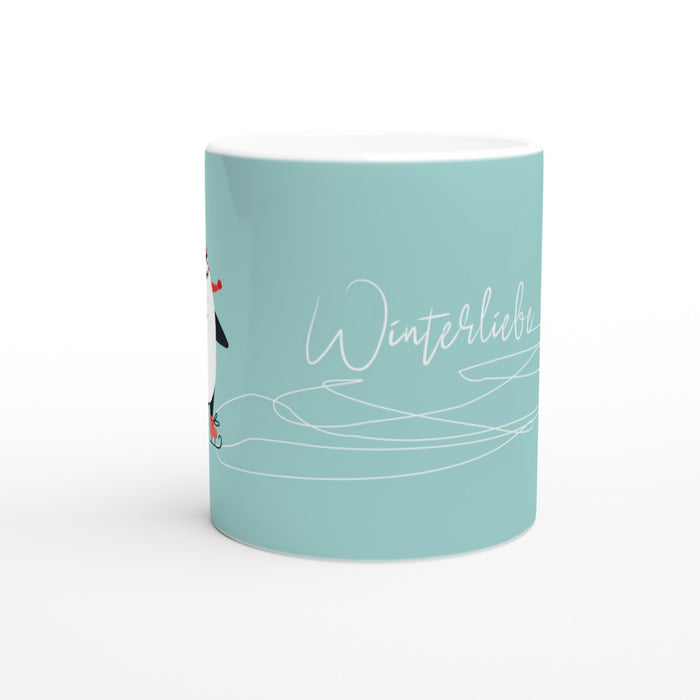 Tasse Winterliebe - süßer Pinguin mit Wollmütze läuft Schlittschuh